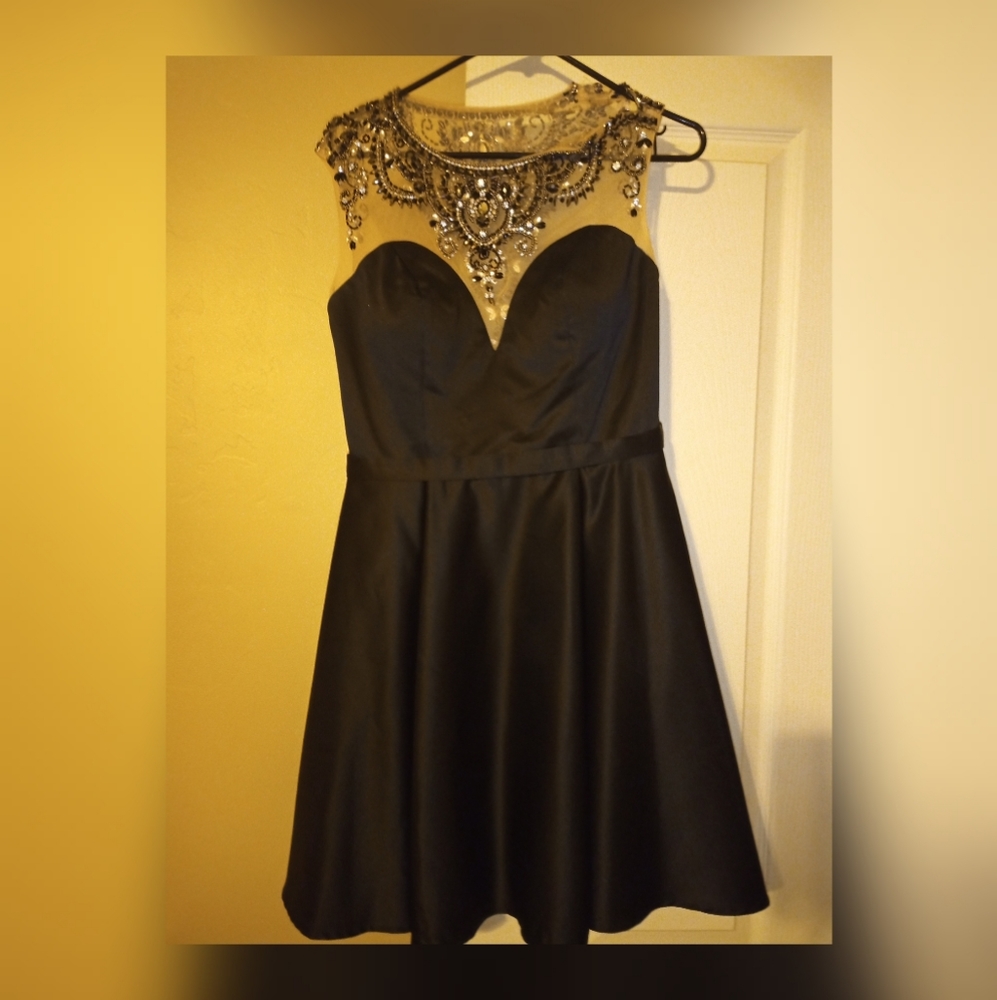 Tailor made cocktail dress with sequins
